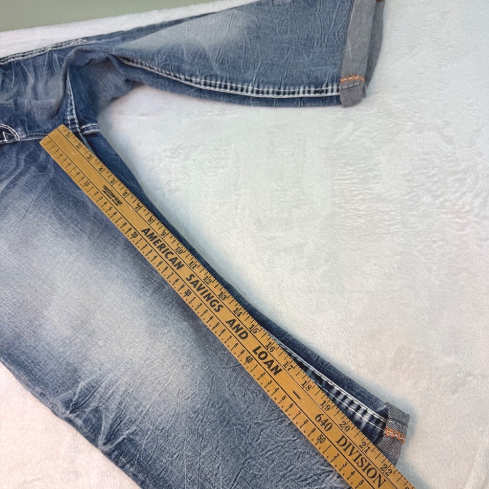Rock Revival Distressed Mid-Blue Cropped Jeans with Embellished Pockets - Picture 10 of 11